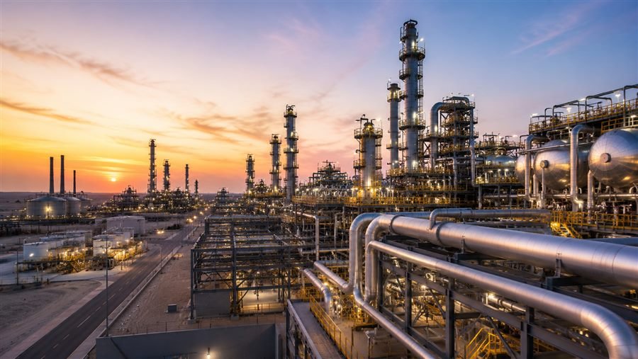 Refinery processing units at sunset